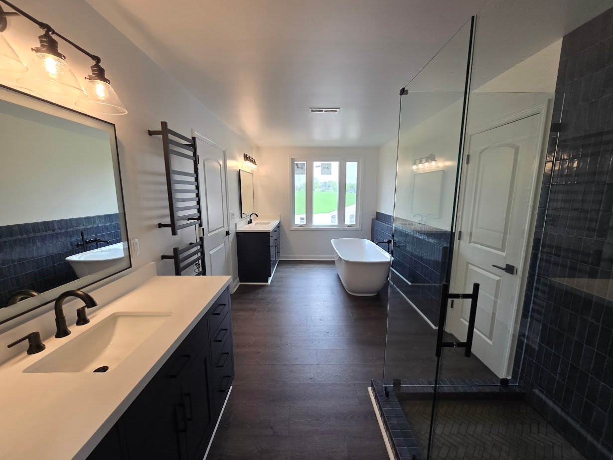 Modern bathroom remodeling in Clarksville TN with freestanding tub and walk-in shower